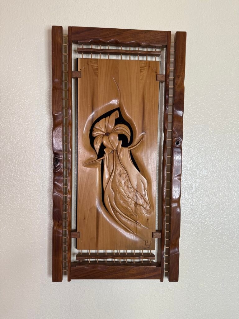 Bloom handcrafted wood carved wall art panel featuring relief-carved lily flower with walnut lattice frame by Jzine Art