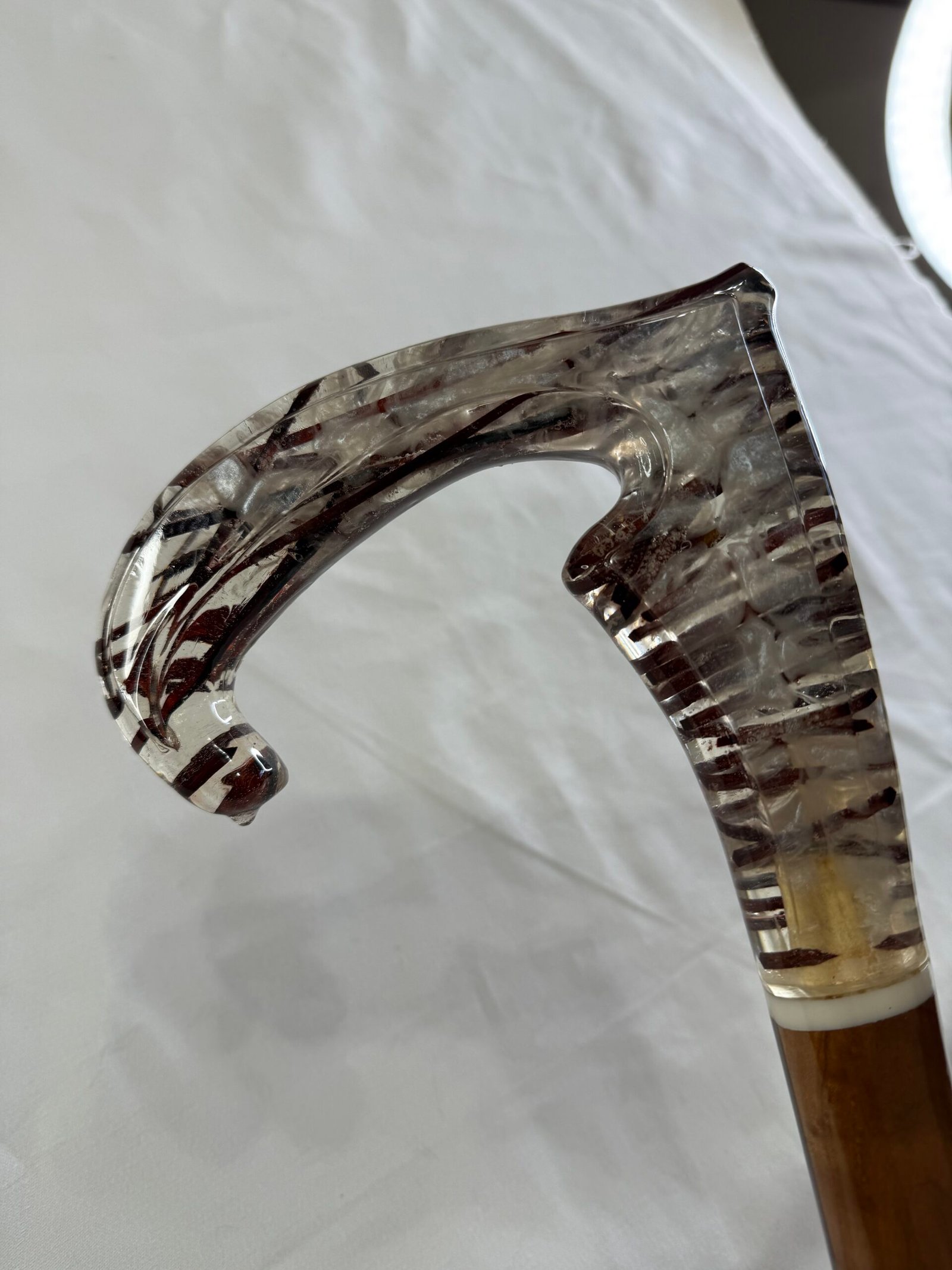 Elegant wooden walking cane with modern acrylic grip