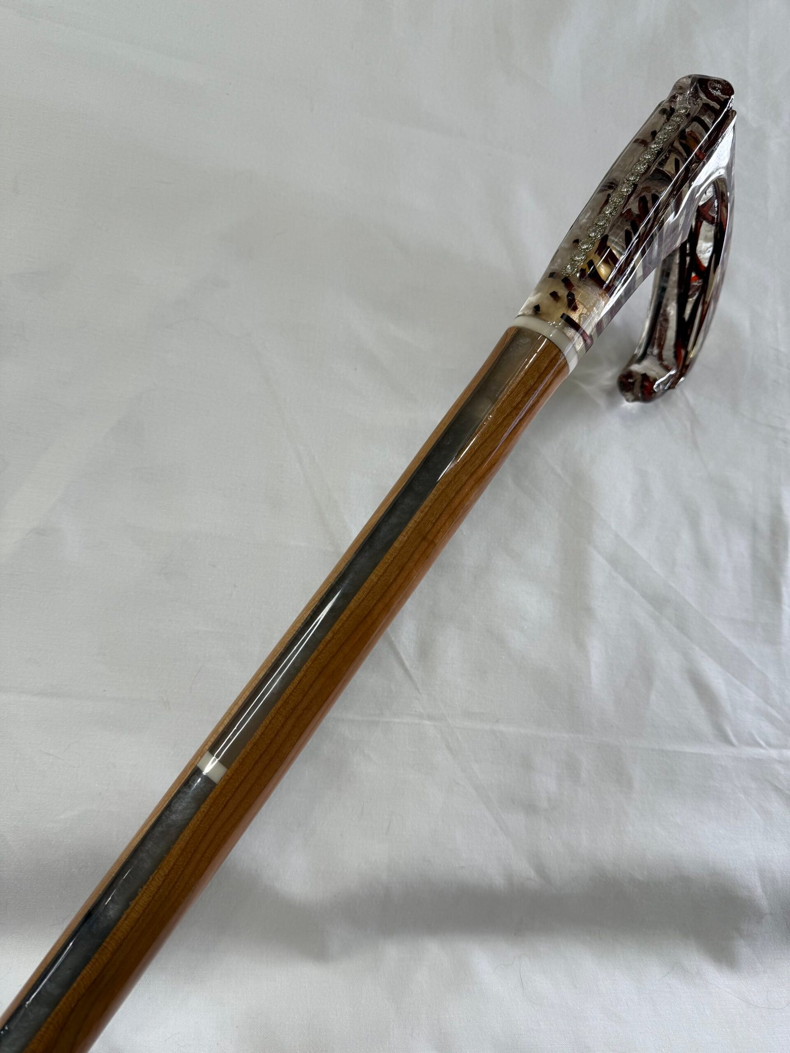 Stylish mobility cane with artistic resin handle detail